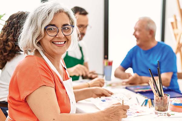 Life Long Learning Student in Painting Class