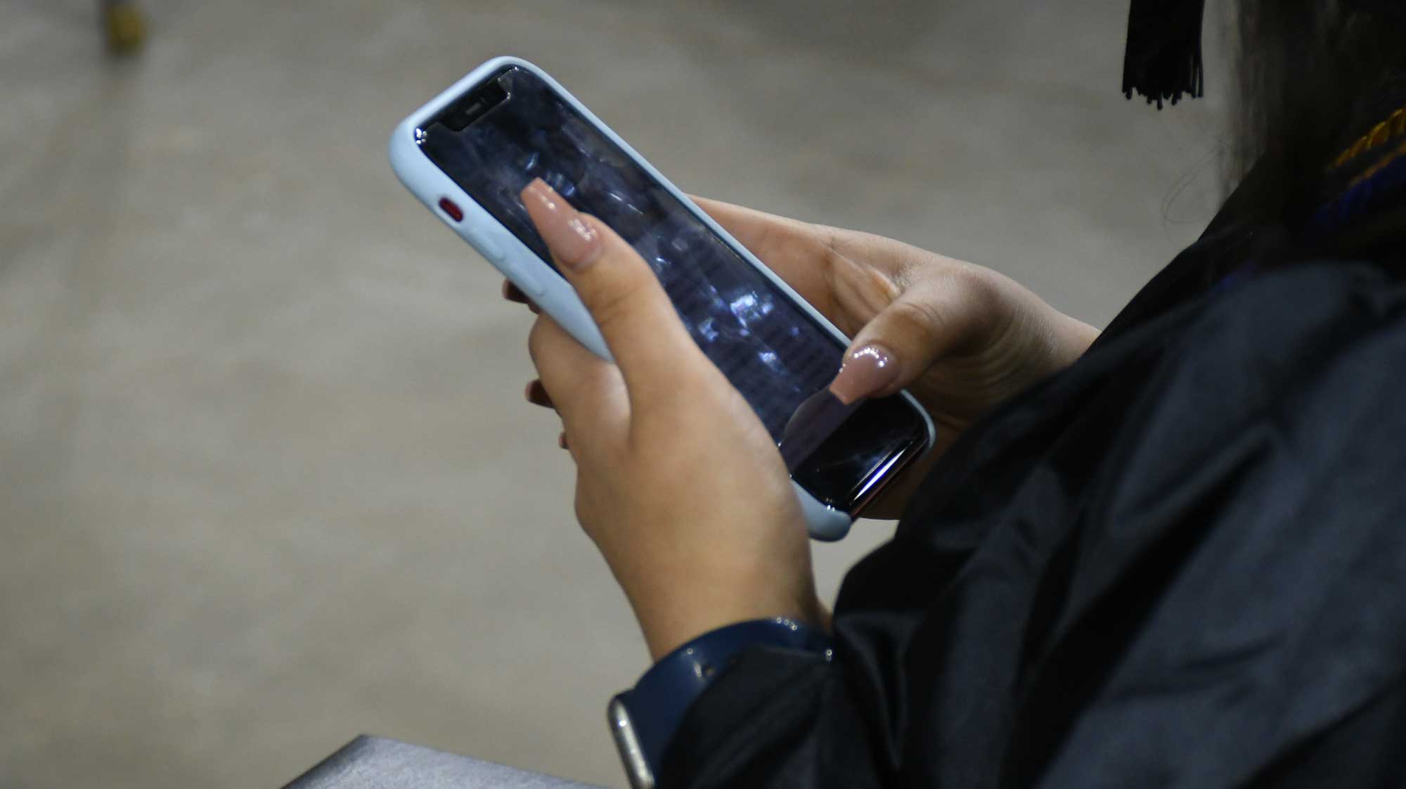 Student using a smartphone