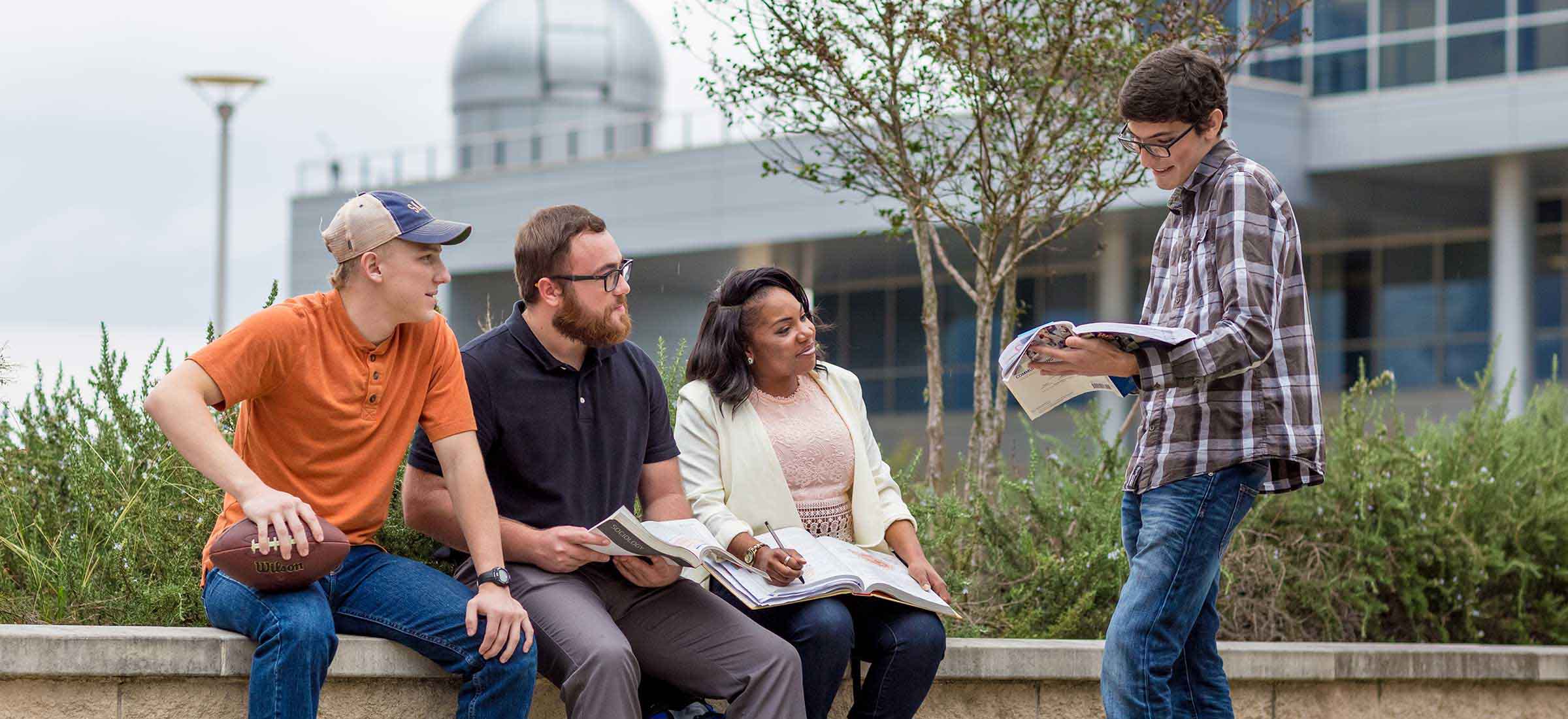 Social and Behavioral Sciences students studying outside