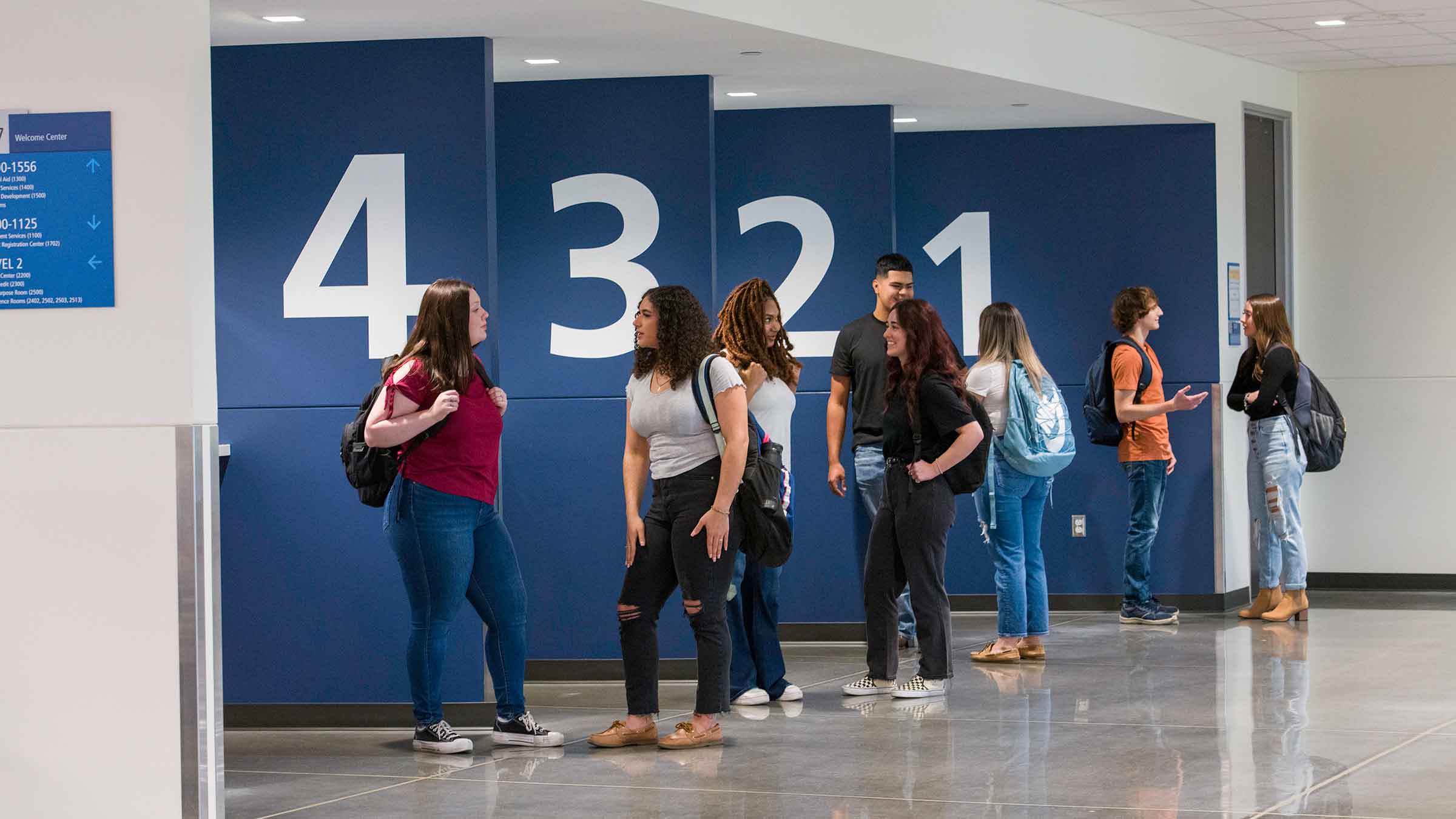 College Students at Business Office Windows