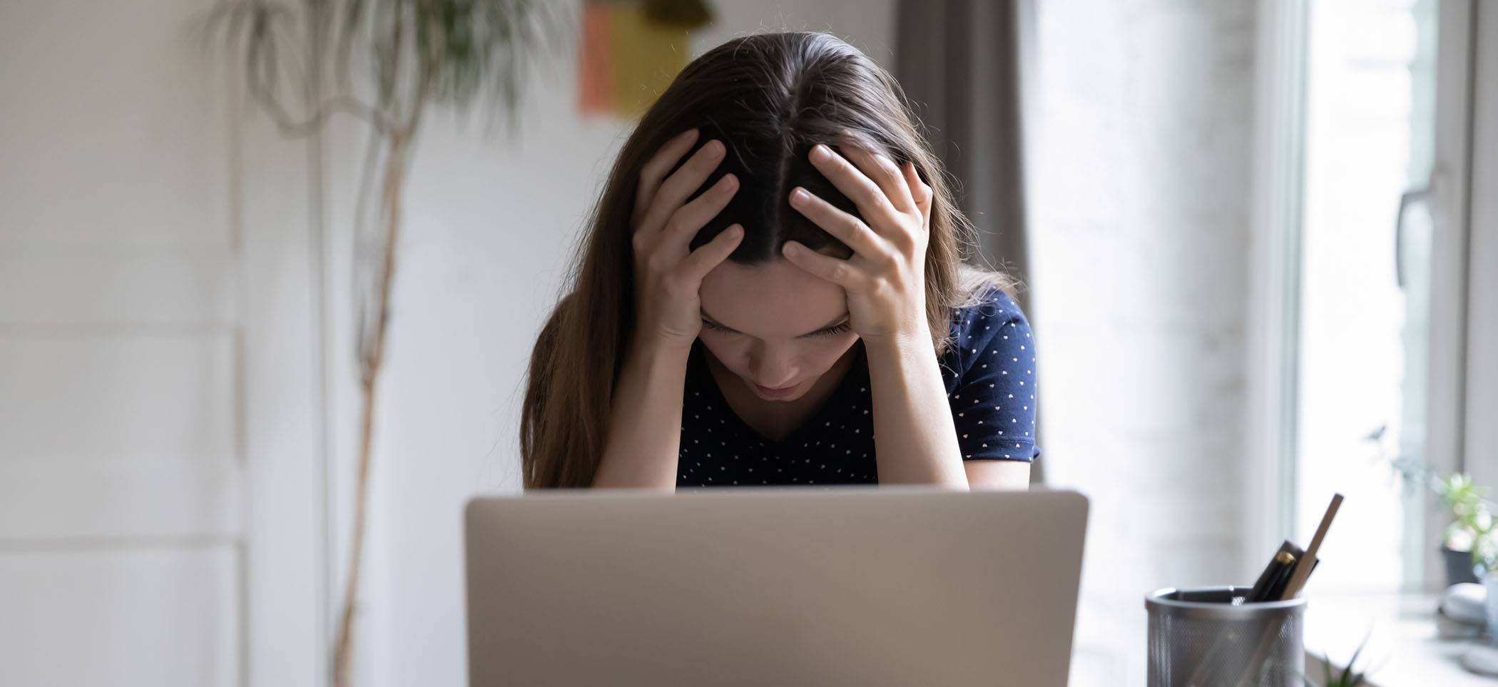 frustrated woman on laptop